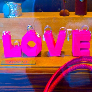 Big pink letters spell LOVE. for teen mental health work with families